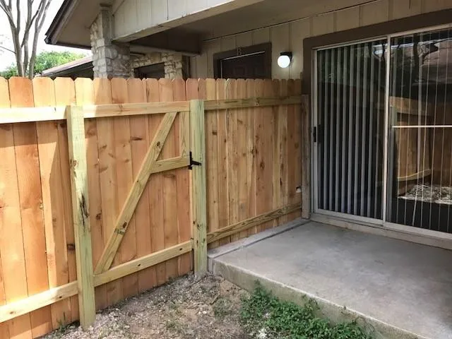 a view of a porch with wooden floor