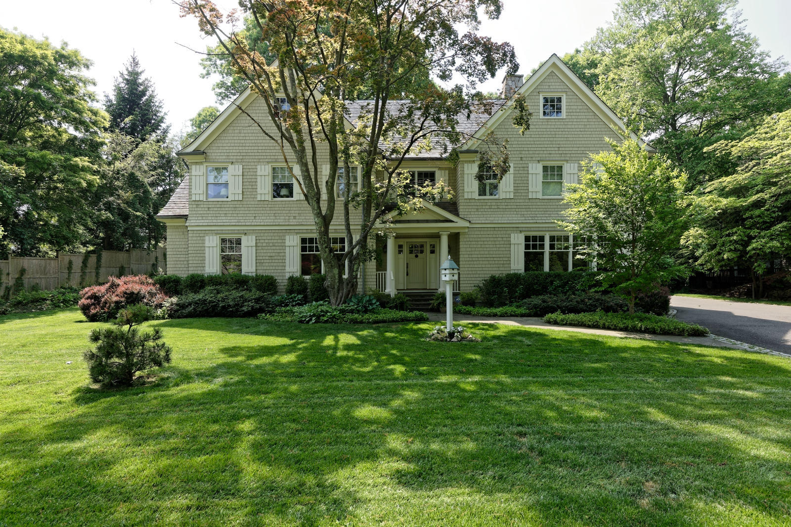 7 Ledge Road Rowayton, CT 06853 - Photo 1 of 30 a front view of a house with a yard