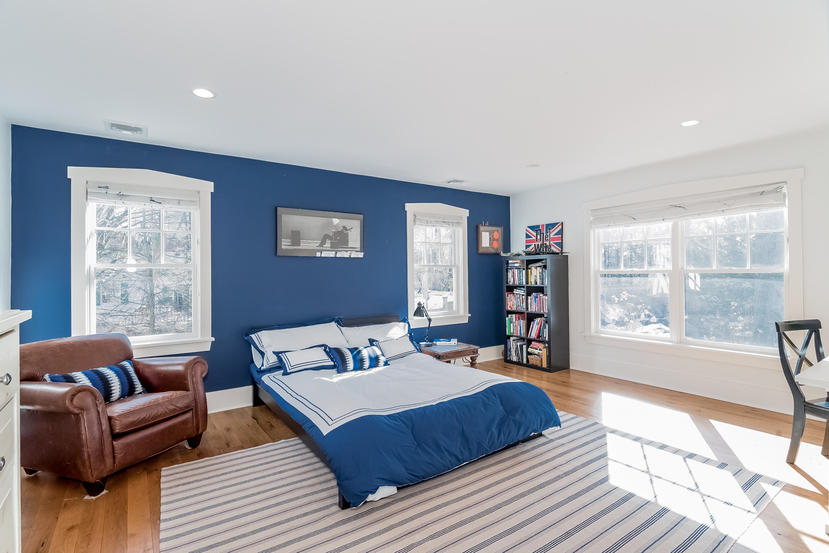 7 Ledge Road Rowayton, CT 06853 - Photo 17 of 30 a bedroom with a large bed and a couch