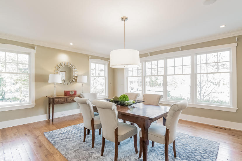7 Ledge Road Rowayton, CT 06853 - Photo 3 of 30 a dining room with furniture a chandelier and wooden floor