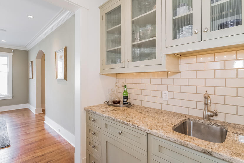 7 Ledge Road Rowayton, CT 06853 - Photo 4 of 30 a kitchen with granite countertop a sink and a wooden floor