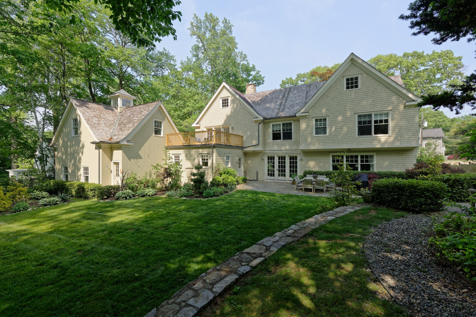 7 Ledge Road Rowayton, CT 06853 - Photo 10 of 30 a front view of a house with a yard and porch