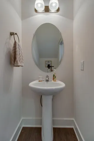 a bathroom with a sink and mirror