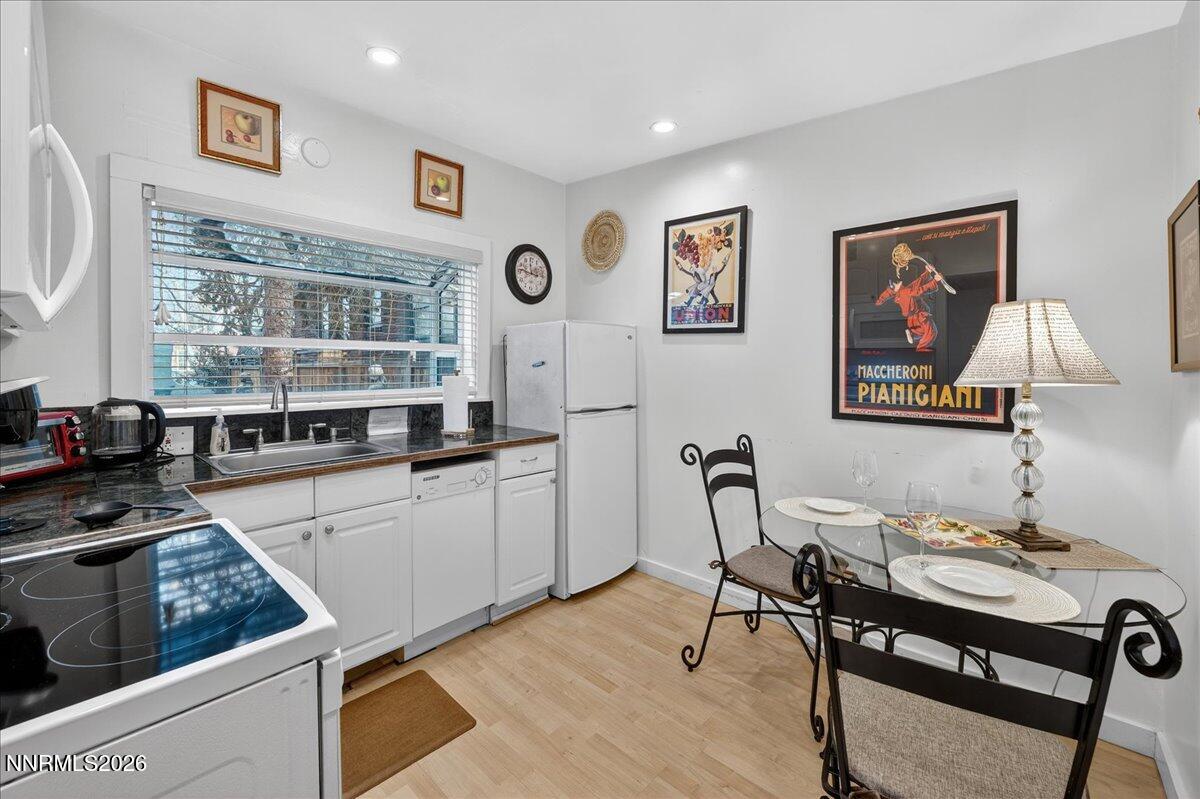 611 Nixon Avenue Reno, NV 89509 - Photo 20 of 43 a kitchen with a table and chairs in it
