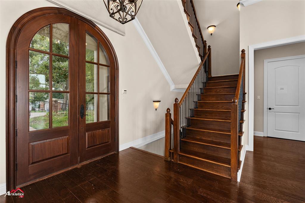 1 Lake Point Place Shreveport, LA 71119 - Photo 11 of 38 a view of entryway with wooden floor and stairs