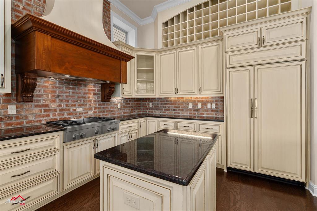1 Lake Point Place Shreveport, LA 71119 - Photo 14 of 38 a kitchen with stainless steel appliances granite countertop a sink and cabinets