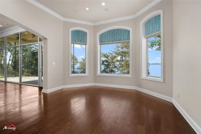 a view of cabinets with wooden floor