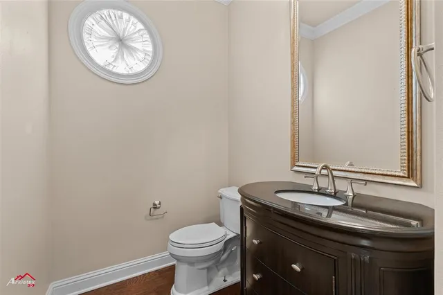 a bedroom with a balcony a bed and a fireplace