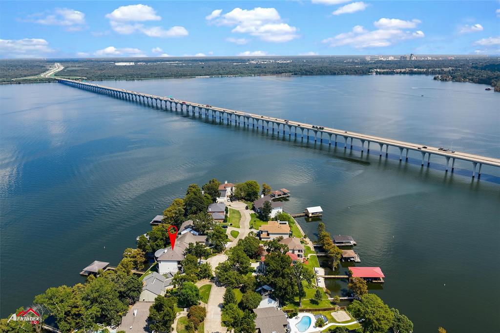 1 Lake Point Place Shreveport, LA 71119 - Photo 2 of 38 a view of a lake and outdoor space