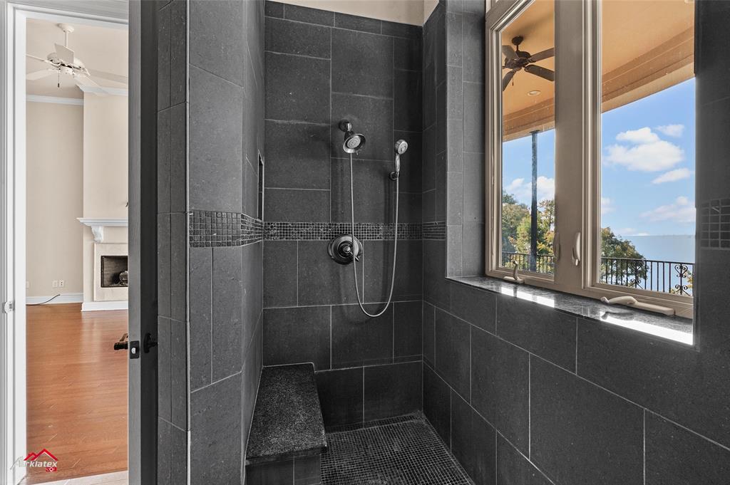 1 Lake Point Place Shreveport, LA 71119 - Photo 24 of 38 a bathroom with a glass shower door