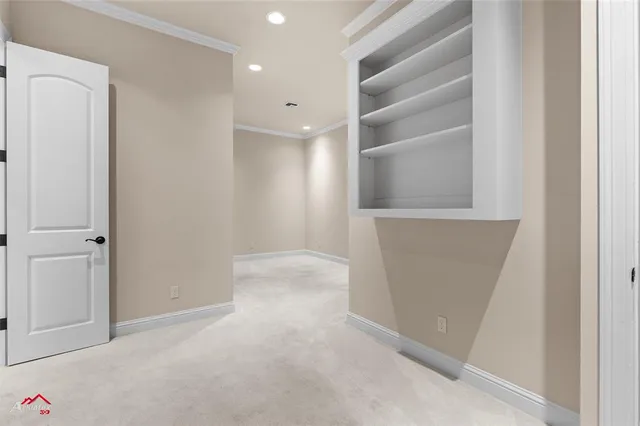 a kitchen with a sink and a refrigerator