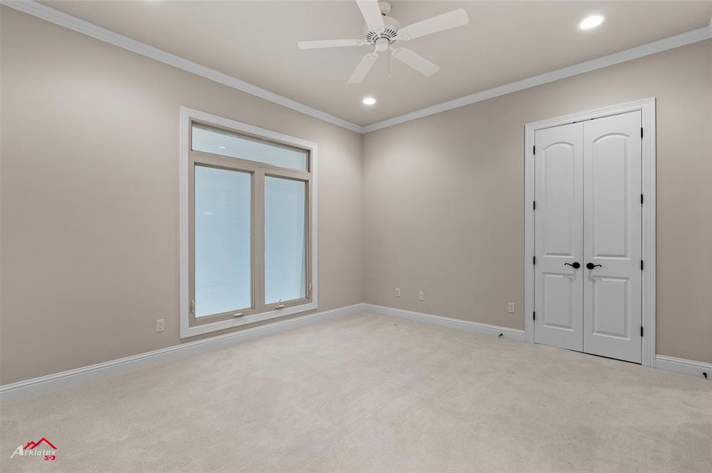 1 Lake Point Place Shreveport, LA 71119 - Photo 32 of 38 a view of an empty room and chandelier fan