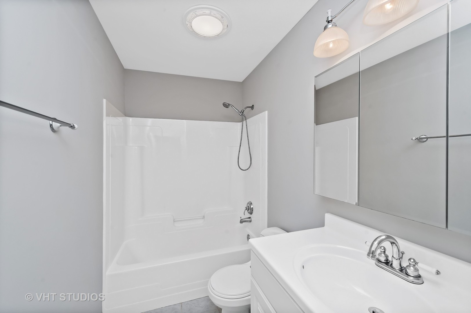 716 Old Hunt Road Fox River Grove, IL 60021 - Photo 8 of 10 a bathroom with a sink a toilet and shower