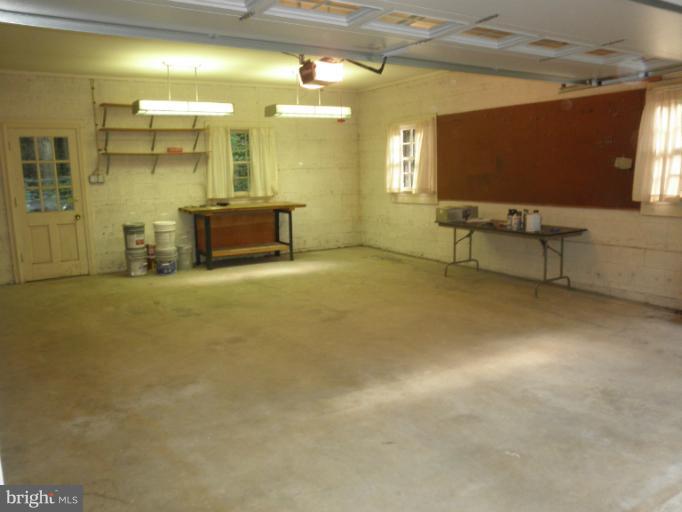 12140 Stirrup Road Reston, VA 20191 - Photo 26 of 30 Garage with Work Bench