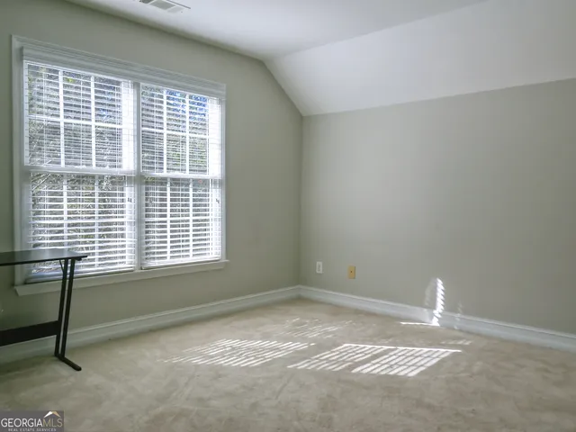 a bathroom with a toilet a sink and bathtub