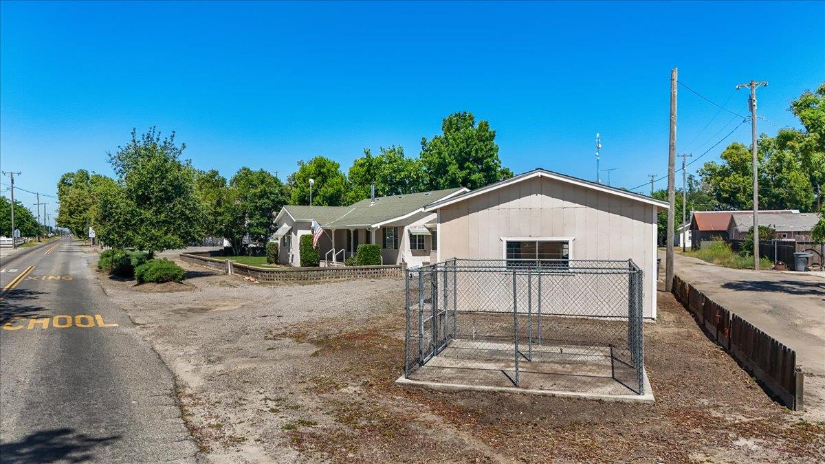 4701 Lone Tree Road Valley Home, CA 95361 - Photo 47 of 59 a house view with a outdoor space