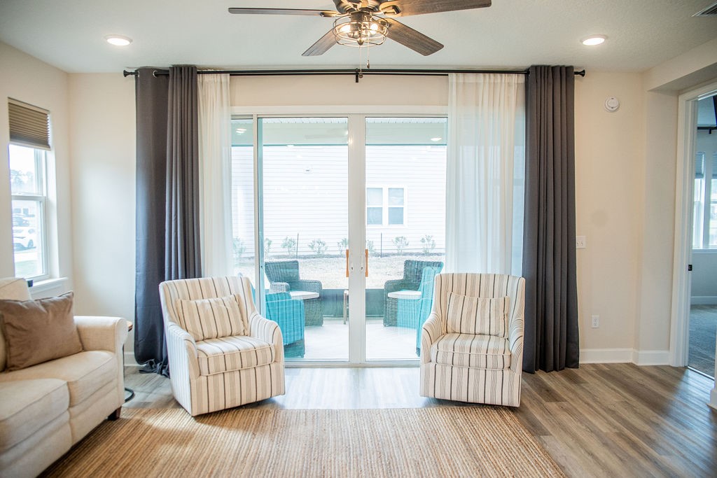 75405 Sunberry Drive Yulee, FL 32097 - Photo 11 of 46 living room opening to screened lanai