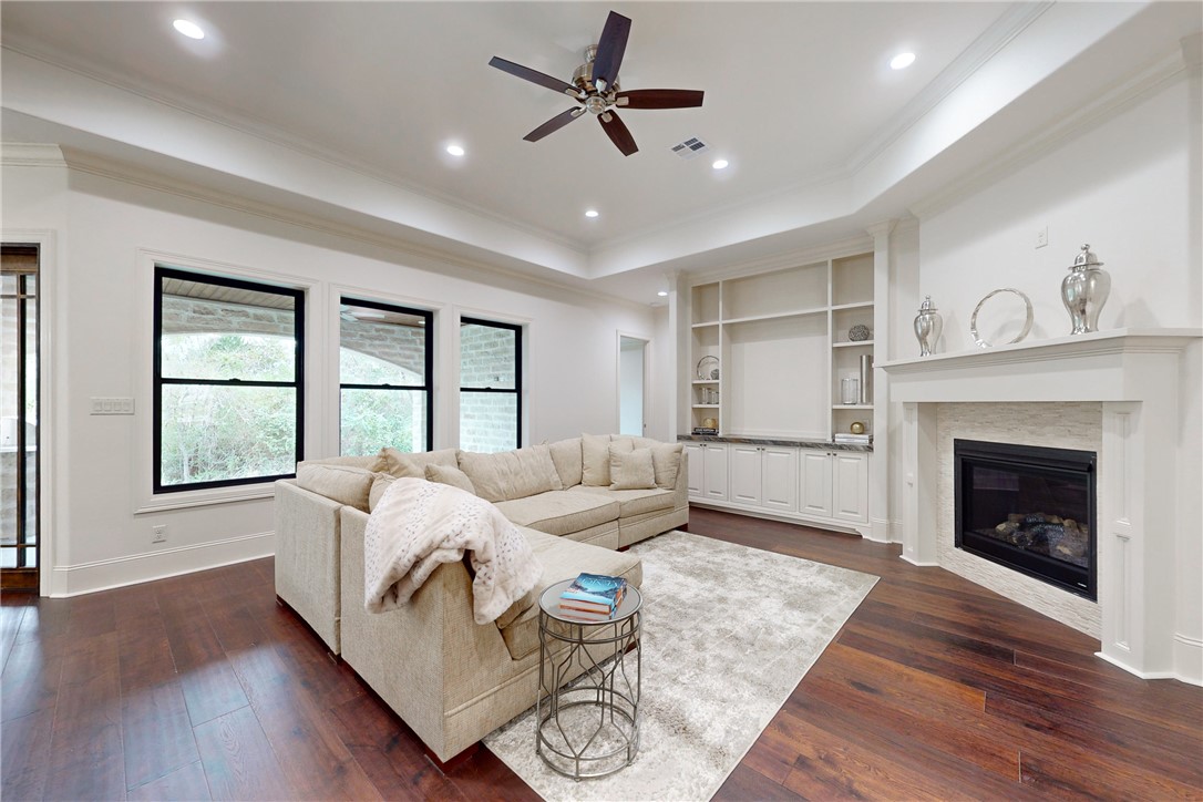 3317 Legacy Court Bryan, TX 77802 - Photo 8 of 28 a living room with furniture and a fireplace