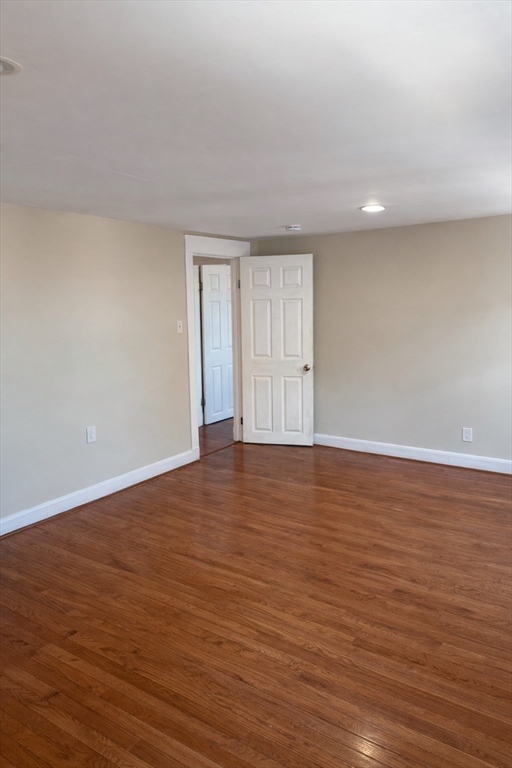 10 Orange Street, Unit 2 Chelsea, MA 02150 - Photo 14 of 17 a view of empty room with wooden floor and fan