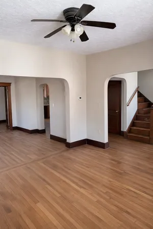 a view of a livingroom with wooden floor