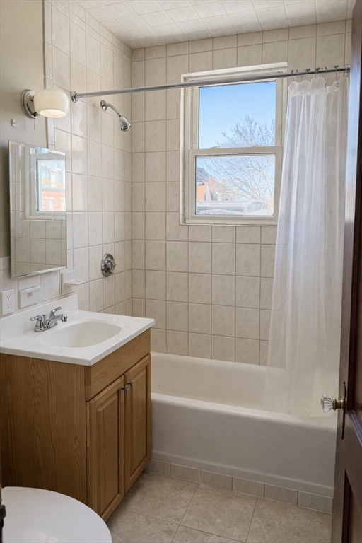 10 Orange Street, Unit 2 Chelsea, MA 02150 - Photo 10 of 17 a bathroom with a sink toilet and shower