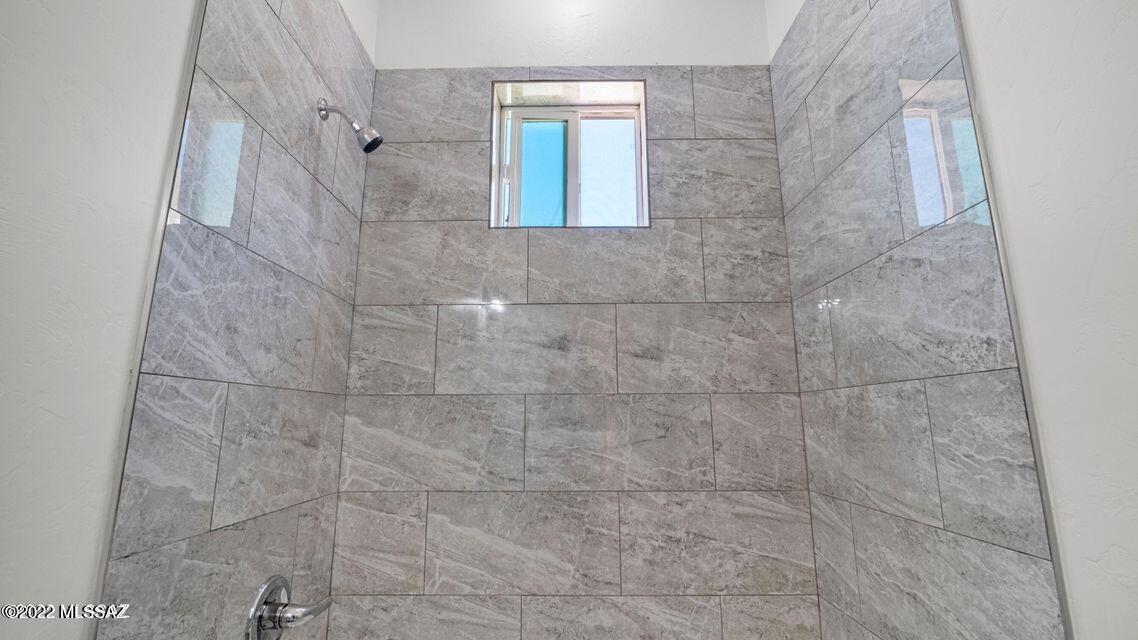 286 Guaymas Rio Rico, AZ 85648 - Photo 9 of 12 a bathroom with a shower