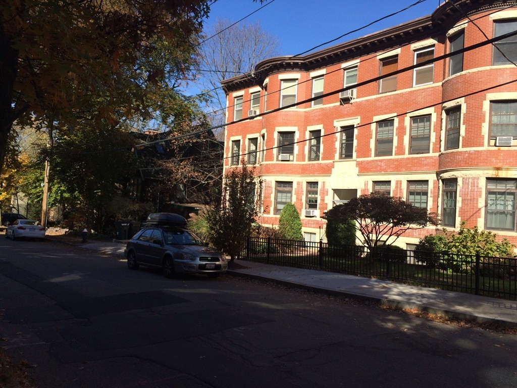 149 Winthrop Road, Unit 1 Brookline, MA 02445 - Photo 19 of 21 a car parked in front of a building