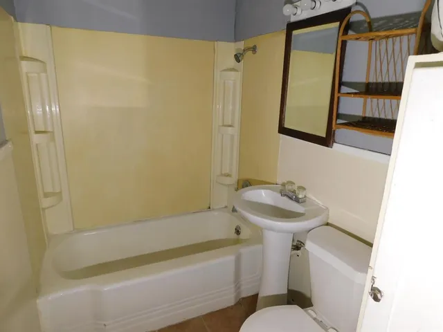 a view of a small space with a window