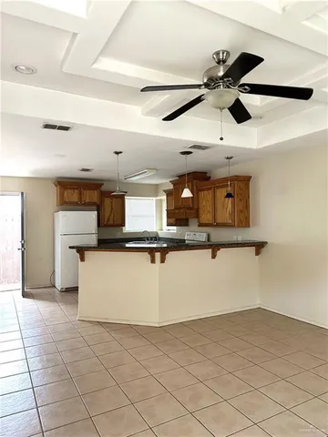 a view of kitchen and living room