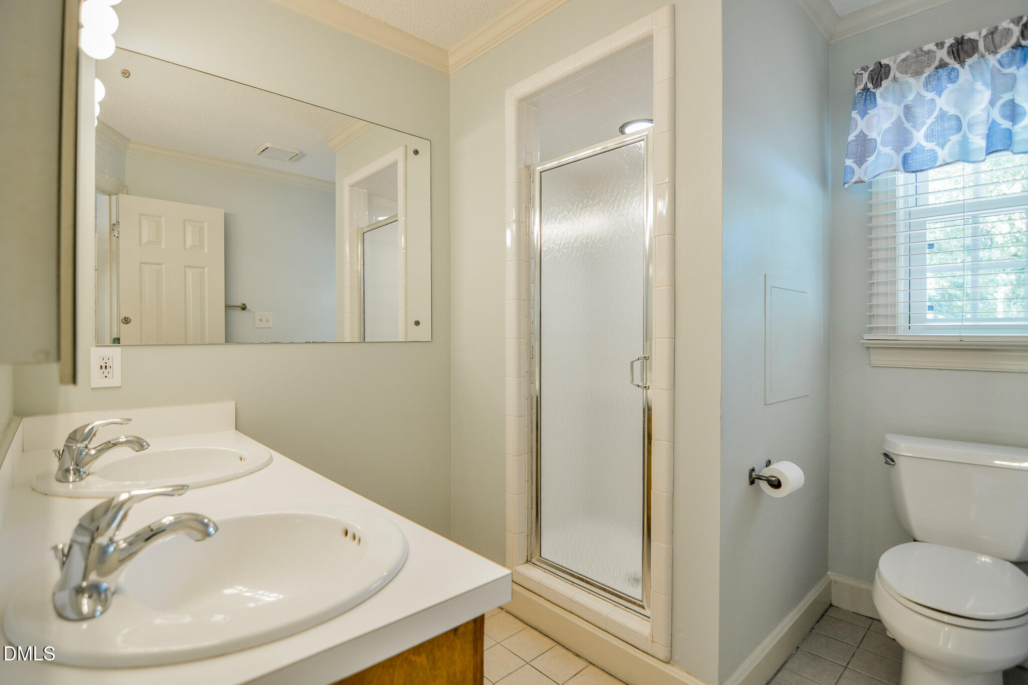 1215 Cambridge Road Northwest Wilson, NC 27896 - Photo 42 of 54 a bathroom with a sink and a mirror