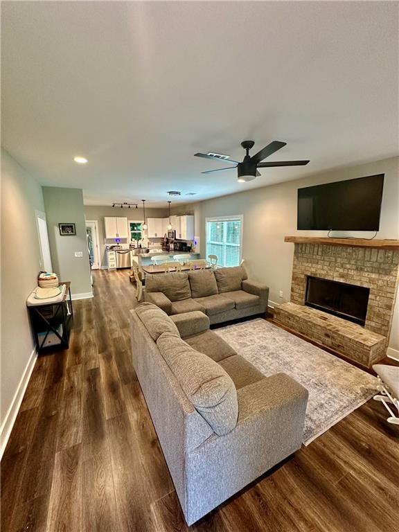 815 Poplar Street Monticello, GA 31064 - Photo 3 of 33 a living room with furniture and a fireplace