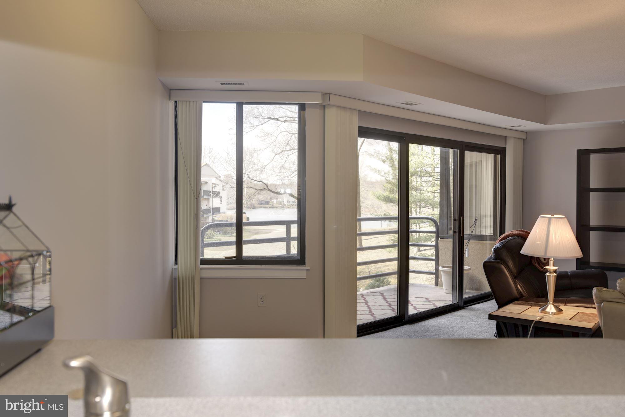 10001 Windstream Drive, Unit 404 Columbia, MD 21044 - Photo 10 of 29 a view of a room with a large window