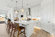 3618 East Roland Street Mesa, AZ 85213 - Photo 4 of 26 a kitchen with a table and chairs in it