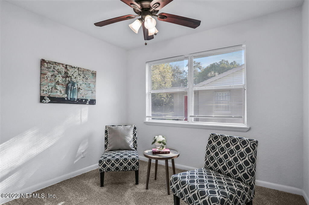 4657 Colchester Road Jacksonville, FL 32208 - Photo 16 of 23 a living room with furniture and windows