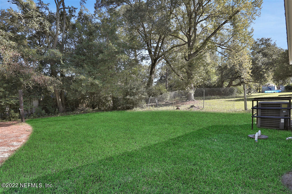 4657 Colchester Road Jacksonville, FL 32208 - Photo 21 of 23 a view of yard with green space