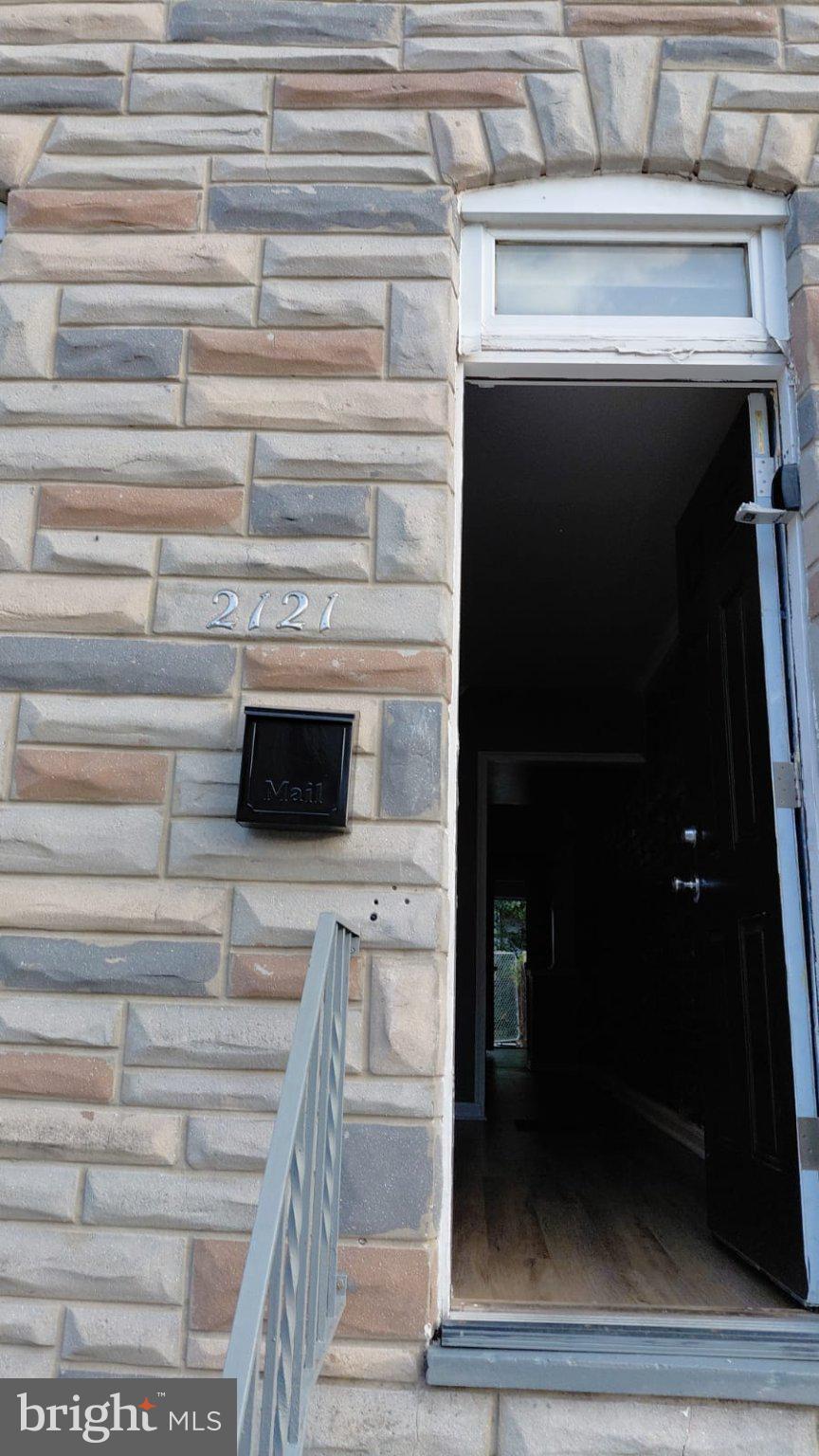 2121 Wilhelm Street Baltimore, MD 21223 - Photo 9 of 13 Inviting entryway with stone facade.