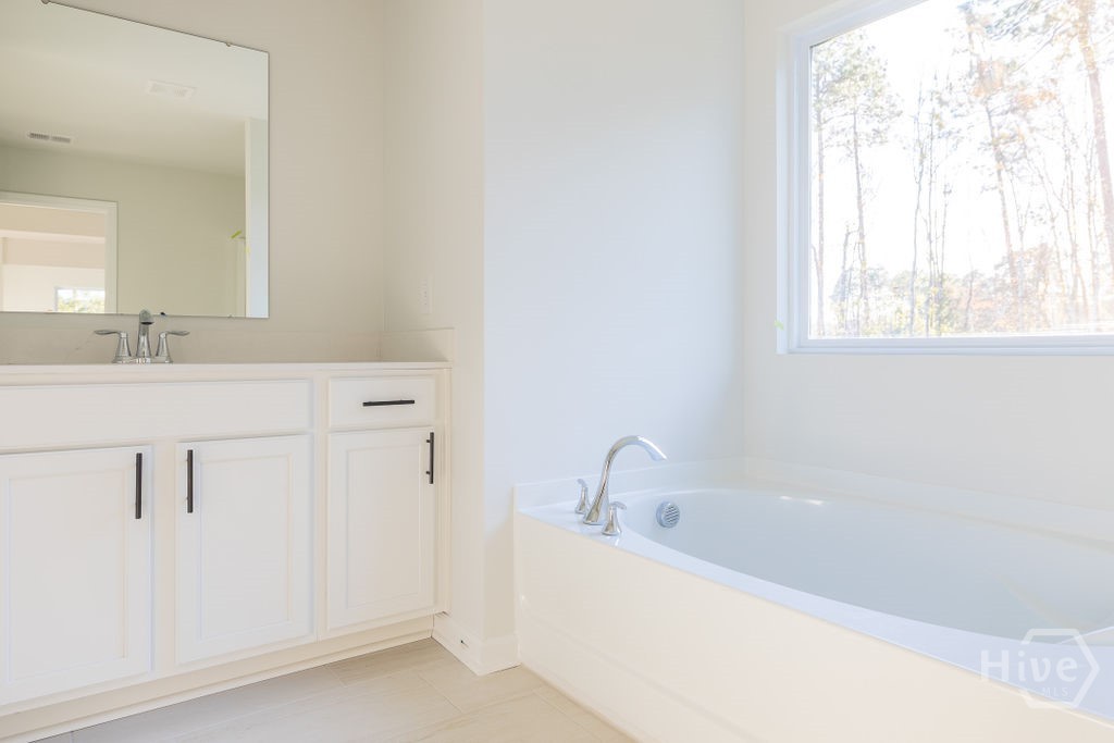 159 Buckeye Road Guyton, GA 31312 - Photo 24 of 24 Separate shower & tub Harbor Oak floor plans available on pre-sale lots in this community.