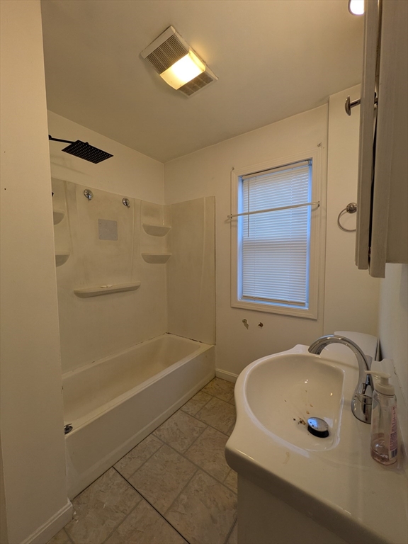 1640 Westover Road Chicopee, MA 01020 - Photo 11 of 20 a bathroom with a sink and a mirror