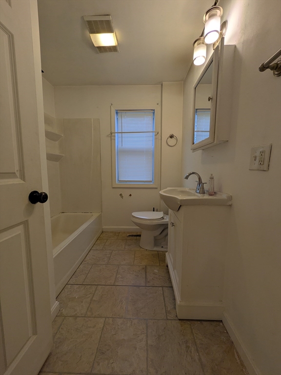 1640 Westover Road Chicopee, MA 01020 - Photo 10 of 20 a bathroom with a sink a toilet and shower