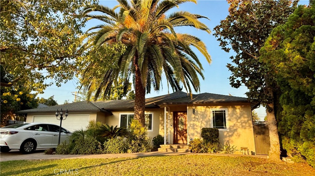230 San Antonio Road Arcadia, CA 91007 - Photo 1 of 19 a front view of a house with garden