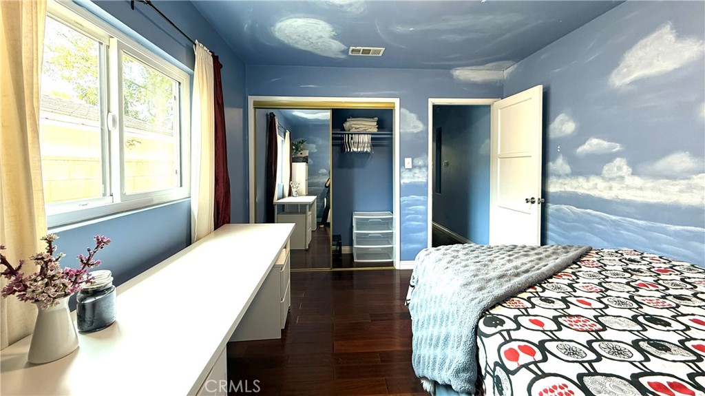 230 San Antonio Road Arcadia, CA 91007 - Photo 17 of 19 a bedroom with bed and a large mirror