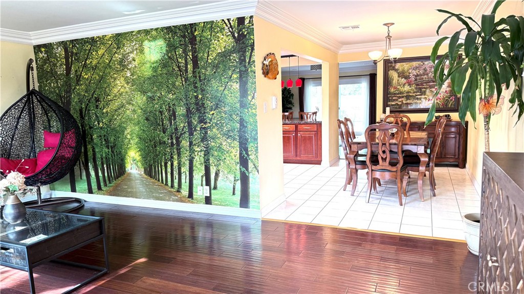 230 San Antonio Road Arcadia, CA 91007 - Photo 4 of 19 a view of a patio with dining table and chairs with wooden floor