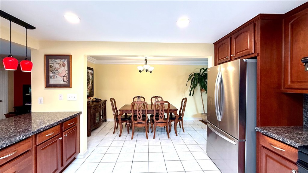 230 San Antonio Road Arcadia, CA 91007 - Photo 7 of 19 a kitchen with granite countertop a refrigerator and a sink