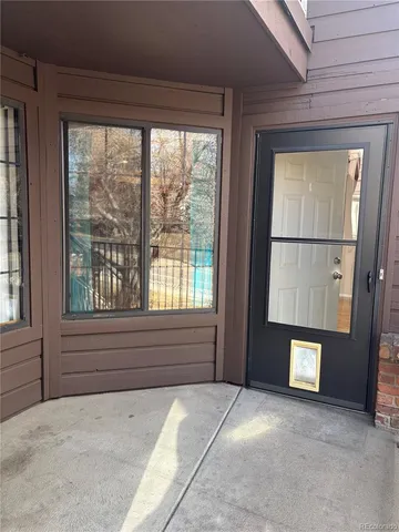 a view of front door with outdoor space