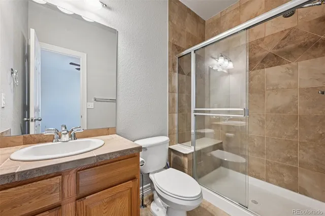 a view of an empty room with closet area