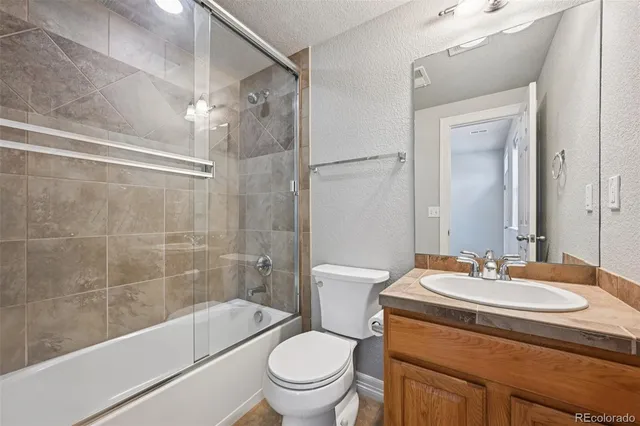 a picture of a bathroom with mirror