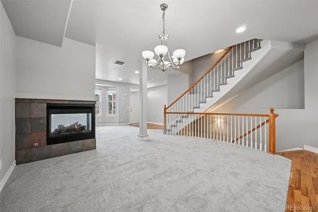 a kitchen with stainless steel appliances granite countertop a refrigerator stove microwave and sink