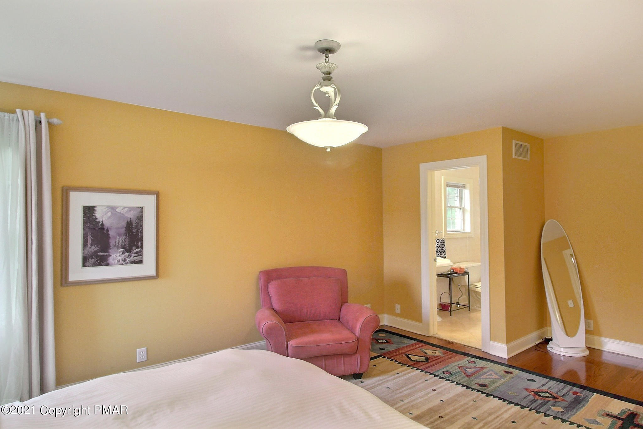170 Chase Road Stroudsburg, PA 18360 - Photo 51 of 83 a bedroom with a bed and wooden floor