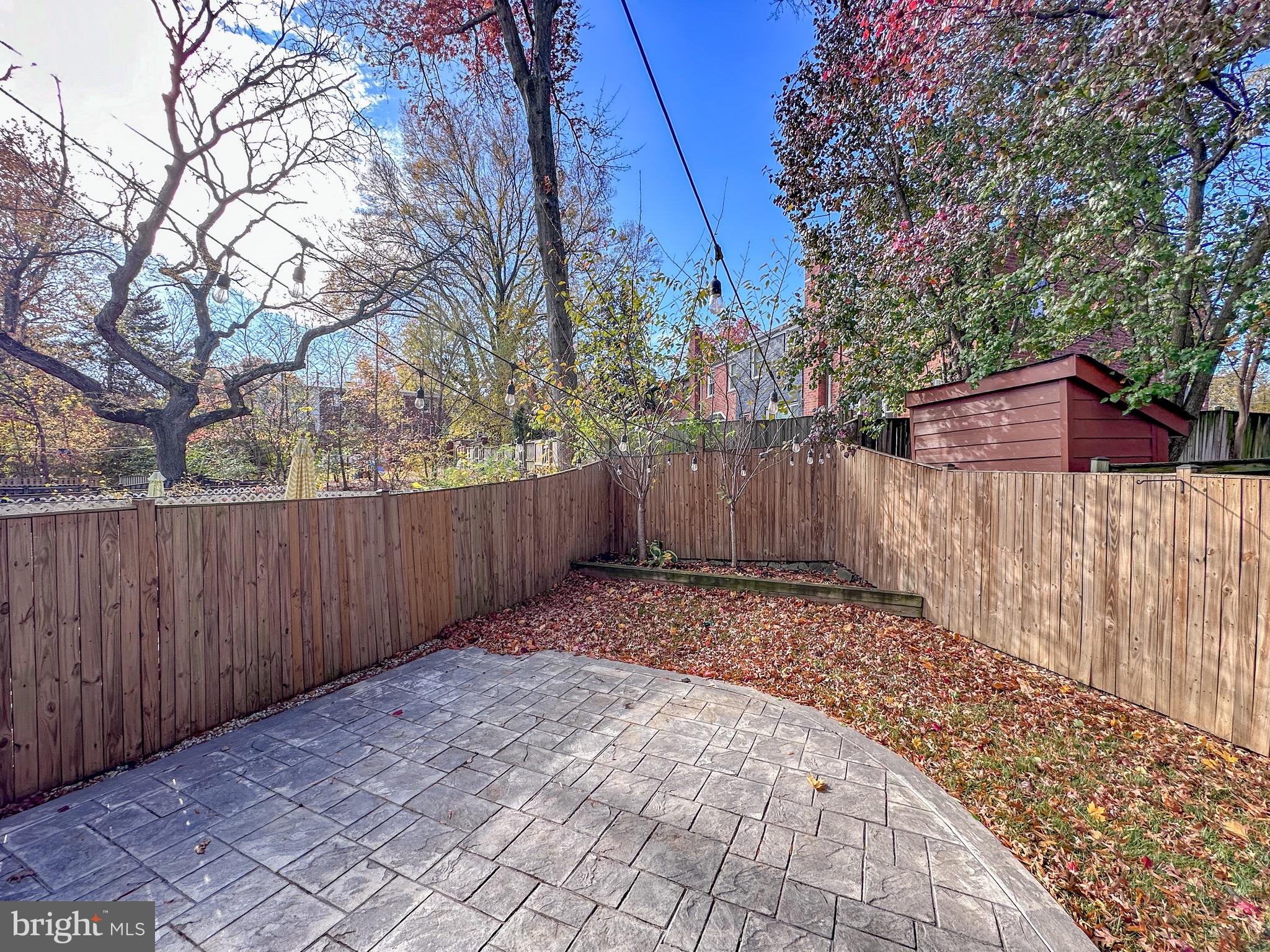 226 Guthrie Avenue Alexandria, VA 22305 - Photo 16 of 54 a backyard of a house with lots of green space