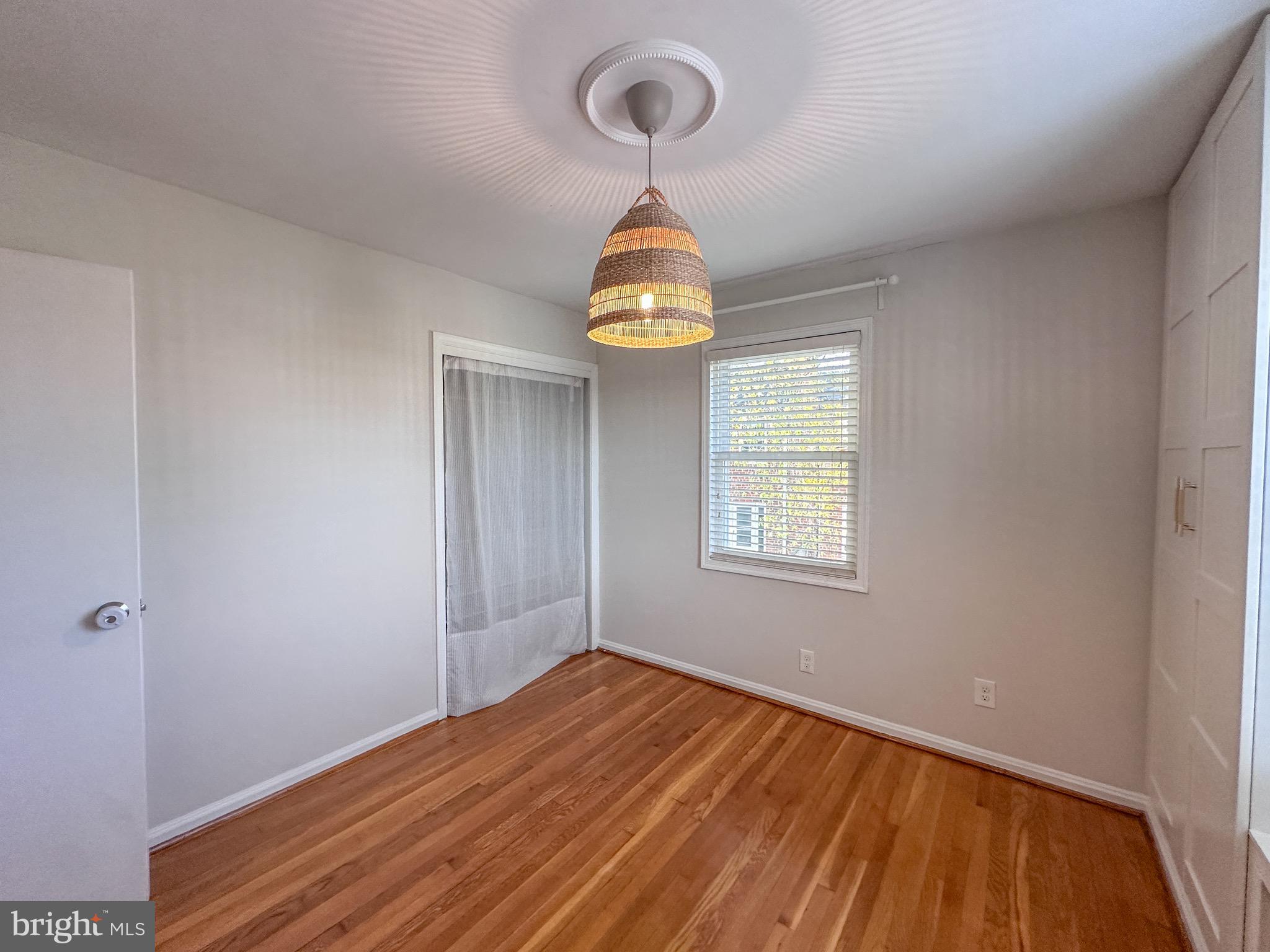 226 Guthrie Avenue Alexandria, VA 22305 - Photo 23 of 54 a room that has a window and wooden floor